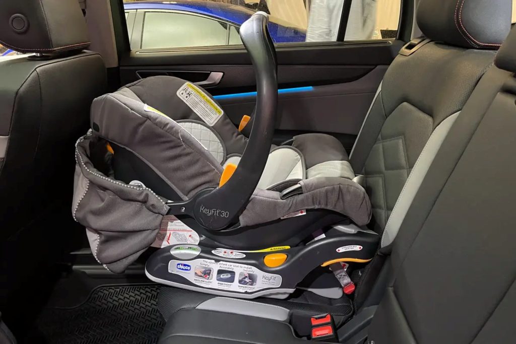 A Baby Safety Seat Safely Secured Into The Comfortable Second Row Of The Impressive And Family-Friendly Volkswagen Atlas